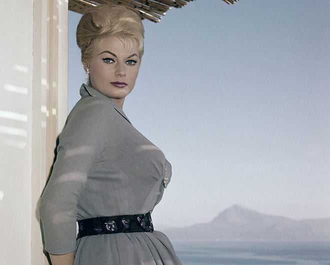 Swedish actress Anita Ekberg poses on the terrace of her hotel in Maratea, southern Italy.