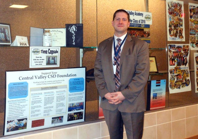 Richard Hughes, whose position as superintendent at Central Valley Central School District became effective Jan. 5, stands in front of the trophy case at Central Valley Academy on Friday. TELEGRAM PHOTO/STEPHANIE SORRELL-WHITE