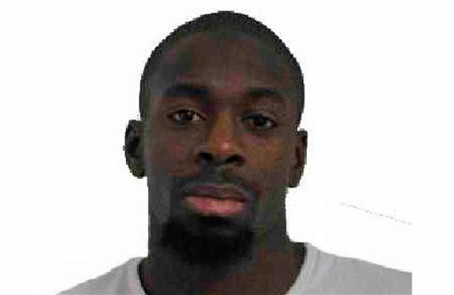 This photo provided by the Paris Police Prefecture Friday, Jan. 9, 2015 shows Amedy Coulibaly A suspect in the kosher market attack.