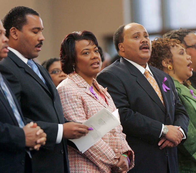FILE - In this Feb. 6, 2006 file photo, the children of Martin Luther King Jr.,and Coretta Scott King, left to right, Dexter Scott King, Rev. Bernice King, Martin Luther King III and Yolanda King participate in a musical tribute to their mother at the new Ebenezer Baptist Church in Atlanta Monday, Feb. 6, 2006. A judge in Atlanta is set to hear motions Tuesday, Jan. 13, 2015, in the legal dispute that pits Martin Luther King Jr.'s two sons against his daughter Bernice in a dispute over two of his most cherished items. (AP Photo/John Bazemore, File)