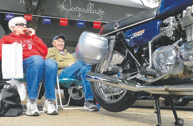 Sarasota snowbirds Marta and Devon Klotz, who spend the warmer months in 
Warsaw, Indiana, tailgate on Main Street with their 1973 Honda CB350F during 
Sarasota's Thunder by the Bay motorcycle festival. STAFF PHOTOS / THOMAS 
BENDER