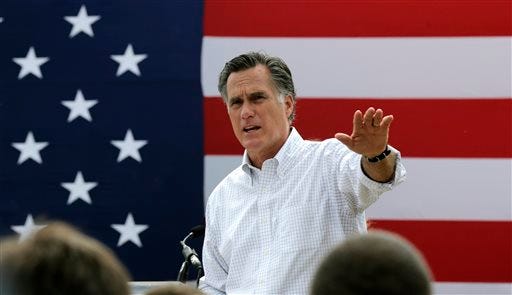 In this July 2, 2014, file photo, Mitt Romney, the former Republican presidential nominee, addresses a crowd of supporters while introducing New Hampshire Senate candidate Scott Brown at a farm in Stratham, N.H. Romney told a small group of Republican donors that he's eying a third run at the White House. The GOP's last presidential nominee held a private meeting with prominent donors in New York on Friday, Jan. 9, 2015. He told the group he's seriously considering launching another presidential campaign.