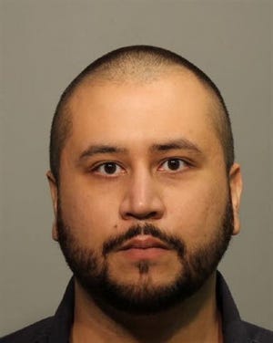 This booking photo provided by the Seminole County Public Affairs shows George Zimmerman on Saturday, Jan. 10, 2015. The Seminole County Sheriff's Office says Zimmerman, 31,was arrested on an aggravated assault charge in Lake Mary about 10 p.m. Friday and is being held at the John E. Polk Correctional Facility.