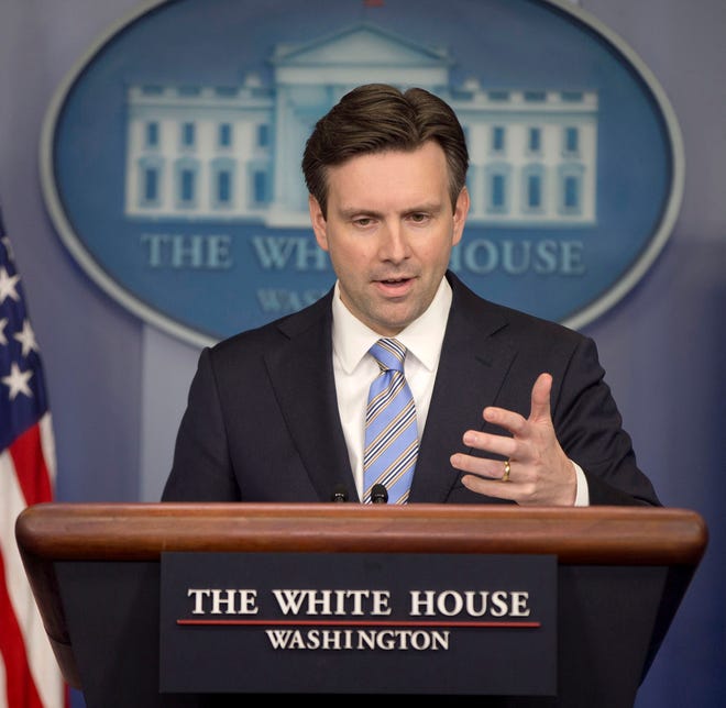 White House Press Secretary Josh Earnest speaks to the media during the daily briefing in the Brady Press Briefing Room of the White House on Monday, Jan. 12, 2015. Earnest said the White House erred in not sending a higher-level official to the anti-terror march in Paris.