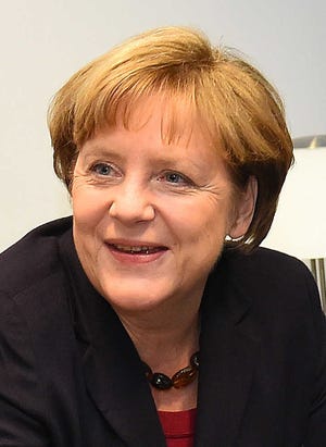 German Chancellor Angela Merkel, at European Council meeting in Brussels, Belgium, Thursday, Dec. 18, 2014. (AP Photo/Emmanuel Dunand, Pool)