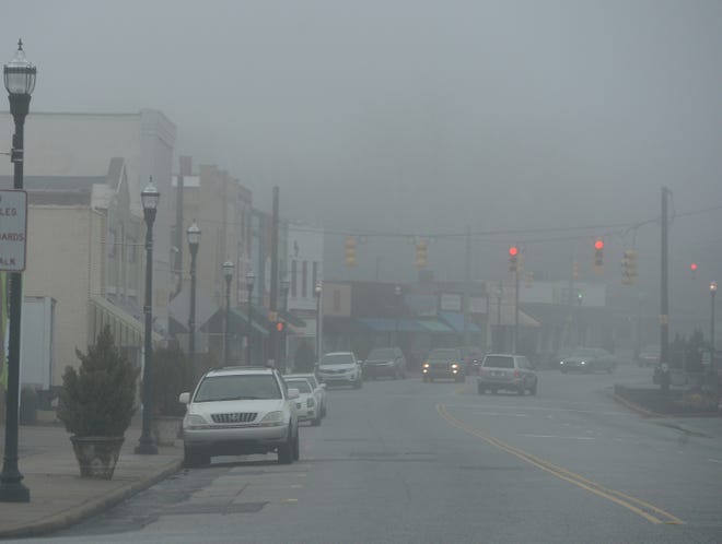 Fog descended on downtown Spartanburg on Monday. The National Weather Service is calling for potential freezing rain Tuesday night or Wednesday morning.