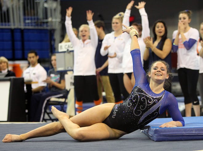 Florida Gators gymnast Bridgette Caquatto competes on the floor against the West Virginia Mountaineers on Friday, March 7, 2014 in Gainesville, Fla. Florida defeated West Virginia 198.325 to 194.925 in their final home meet of the season.