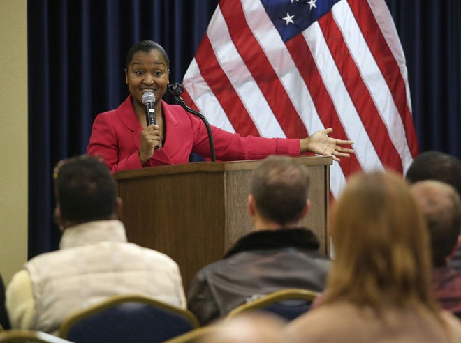 Lola Renee Moore, pastor of the Maranatha and Emmanuel SDA Churches in Northwest Florida, speaks during the Naval Surface Warfare Center Panama City Division’s Martin Luther King Jr. Celebration on Wednesday.