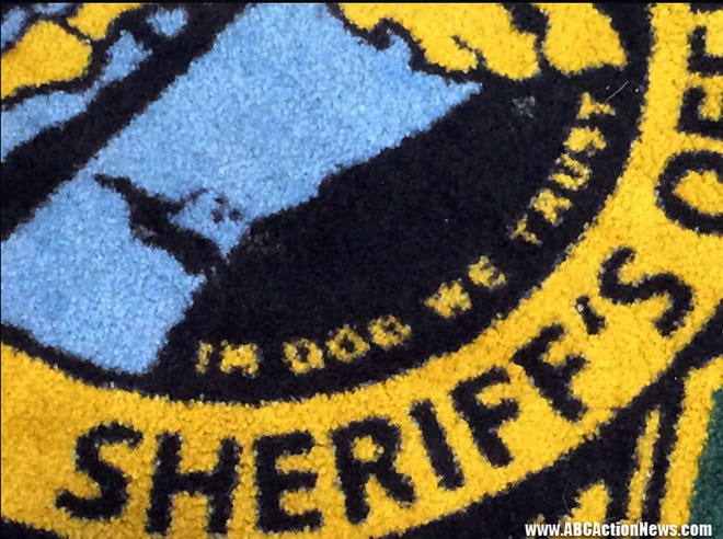 This image released by ABC Action News, shows the Pinellas County Sheriff's Office rug in Largo, which sold for more than $9,000 during an online auction.