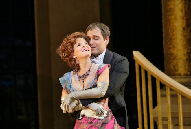 Kelli O'Hara plays Valencienne and Alek Shrader is Camille de Rosillon in the Metropolitan Opera's production of "The Merry Widow," which will be shown live Saturday at Wellfleet Harbor Actors Theater and Cape Cinema in Dennis, with encore showings at both venues later in the month. KEN HOWARD/METROPOLITAN OPERA