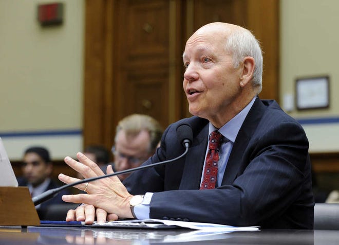 FILE - In this July 23, 2014 file photo, IRS Commissioner John Koskinen testifies on Capitol Hill in Washington. The IRS is cutting taxpayer services to historically low levels just as President Barack Obama's health law will make filing a federal tax return more complicated for millions of families. (AP Photo, File)