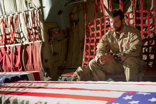 In this image released by Warner Bros. Pictures, Bradley Cooper appears in a scene from "American Sniper."