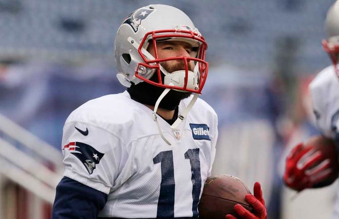 New England Patriots wide receiver Julian Edelman runs a drill during a team practice in Foxborough, Mass., Wednesday, Jan. 14, 2015. The Patriots face the Indianapolis Colts in the AFC Championship. (AP Photo/Charles Krupa)