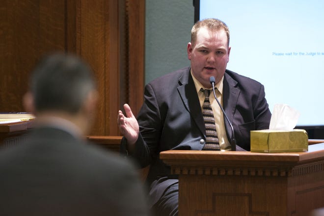 James R. Thompson answers a question from public defender David Wallis during Thompson’s murder trial Thursday at the Boone County Courthouse. Thompson is accused of hiring an Oklahoma man to kill Brian Daniels in 2013.