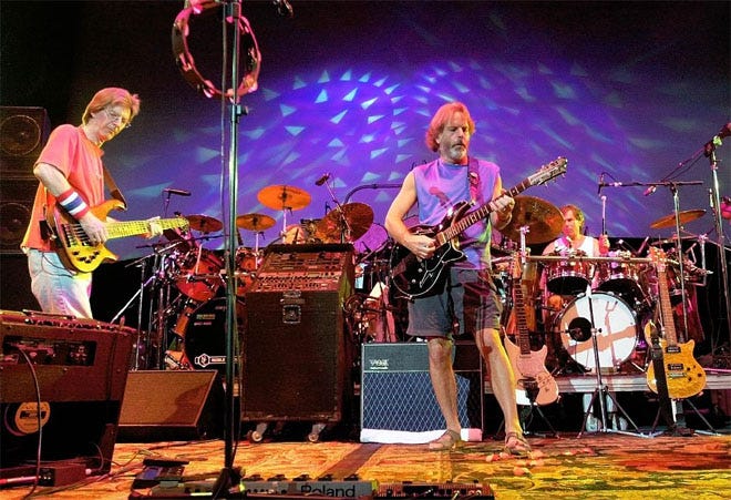 The Grateful Dead, from left, Phil Lesh, Bill Kreutzmann, Bob Weir and Mickey Hart perform in 2002.