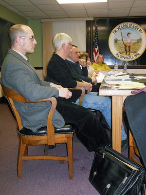 Ilion’s ambulance situation was discussed during Wednesday’s village board meeting. From left are Village Attorney Mark Rose, Fire Chief James Trevett, Police Chief Timothy Parisi, Treasurer Connie Gagliardi, partially visible, and Village Clerk Cindy Kennedy. TELEGRAM PHOTO/DONNA THOMPSON