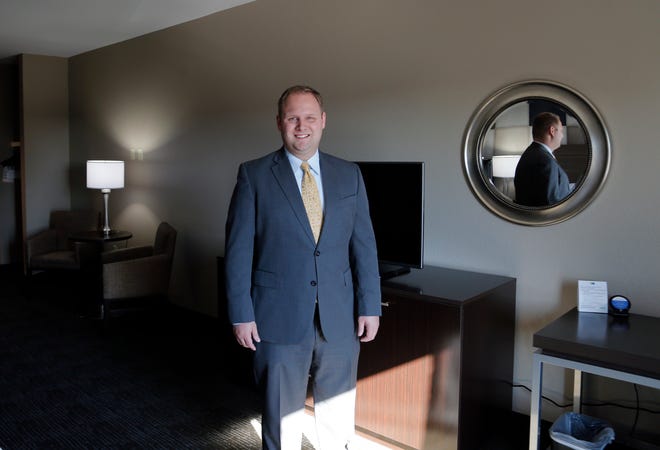 Brian Werkman, General Manager, poses in a room at the new Holiday Inn Express & Suites in Bricktown, East Main Street, Thursday, Jan. 15, 2015. Photo by Sarah Phipps, The Oklahoman