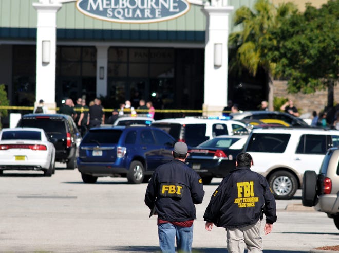 Law enforcement including the FBI respond to the shooting Saturday at the Melbourne Square Mall in Florida.