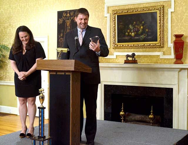Kinston City Manager Tony Sears accepts his Young Professional of the Year Award at the Young Professionals of Lenoir County Gala on Saturday at the Kinston Country Club.