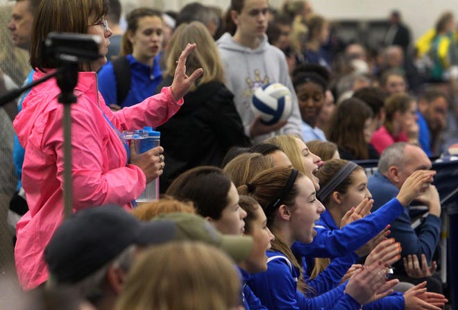 Team members and parents enjoy Saturday’s competition at the Moshofsky Center. (Brian Davies/The Register-Guard)