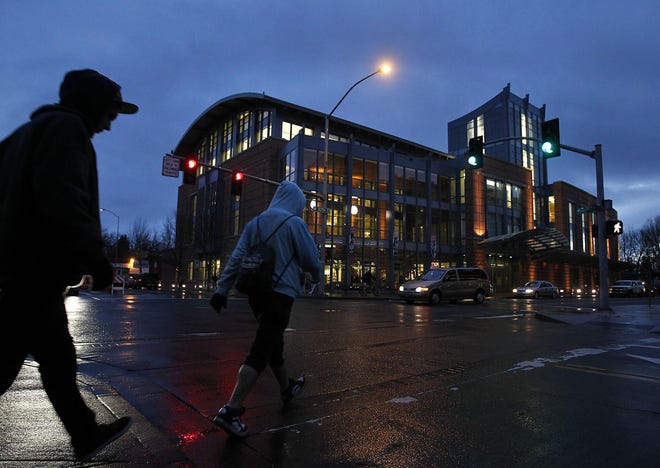 FILEÃ¢Â?Â?The Eugene Library is seen in the evening. The Eugene Library is having its 10th anniversary. (Kevin Clark/The Register-Guard, 2012)