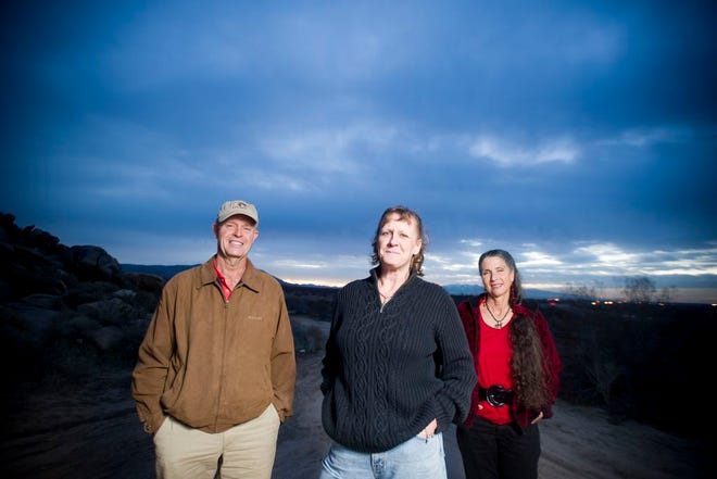 Lorrie Steely, center, with her partners in the Mojave Communities Conservation Collaborative, Neville Slade and Erin D' Orio. Steely's work with the MC3 opposing uncontrolled energy development in the desert earned her a Daily Press person of the year nomination in 2014.