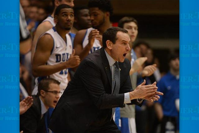 LET’S WIN THIS ONE — Duke head coach Mike Krzyzewski directs his team during the Blue Devils’ game against Pittsburgh on Monday at Cameron Indoor Stadium. Duke won 79-65, giving the coach his 999th career win.