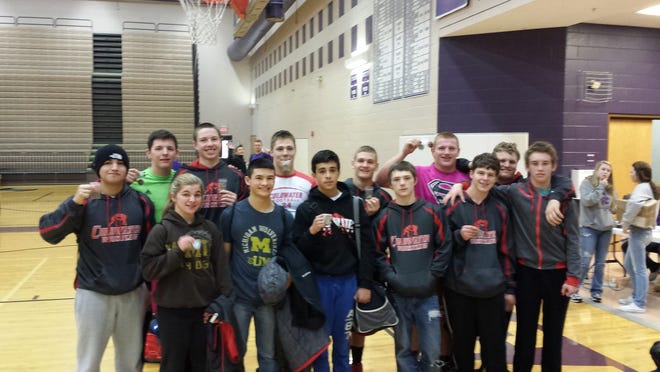 The Coldwater JV wrestlers pose with their medals after a successful invitational.



PHOTO BY CURTIS COVERT