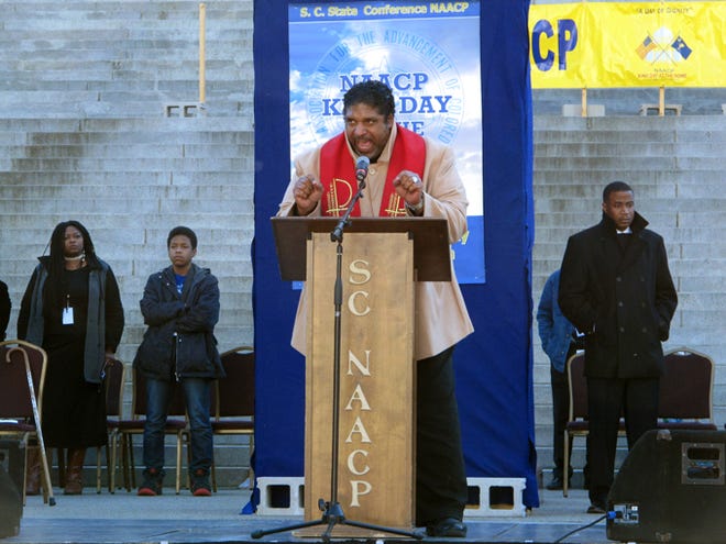 North Carolina NAACP President William Barber speaks at the South Carolina Statehouse on Monday in Columbia. Speakers at the annual South Carolina NAACP's King Day at the Dome rally asked the crowd to fight the apathy that things are good enough with civil rights in America.