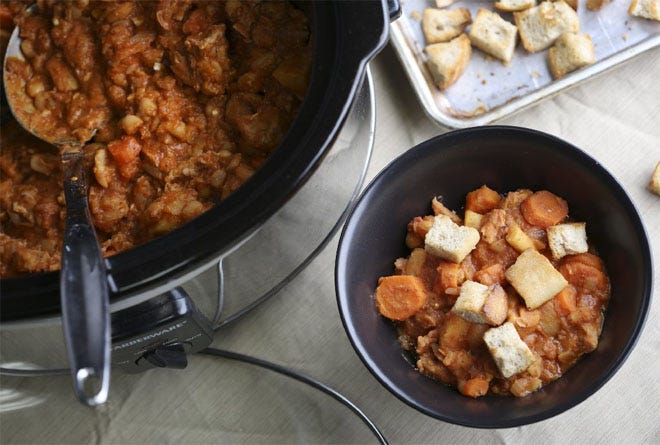 Rustic Pork and White Bean Casserole, which includes carrots and parsnips and a topping of croutons.