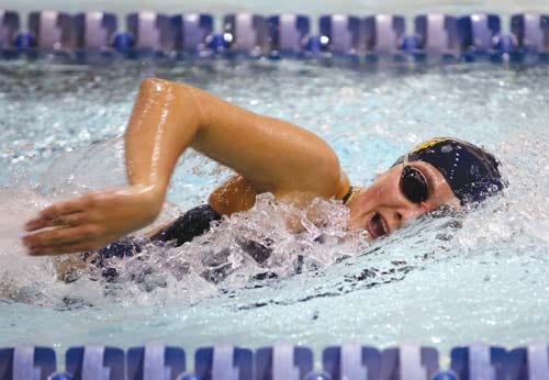 Photo by Marie Dirle/New Jersey Herald — Pope John’s Emily Peter swims the 100-freestyle during the Lions’ meet against Sparta on Tuesday evening at Blair Academy in Blairstown. Pope John beat Sparta, 93-77.