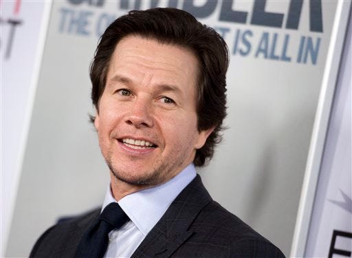 FILE - In this Nov. 10, 2014, file photo, Mark Wahlberg arrives at the 2014 AFI Fest - "The Gambler," in Los Angeles. Wahlberg asked Massachusetts for a pardon for assaults he committed in 1988 when he was a teenager in Boston.
