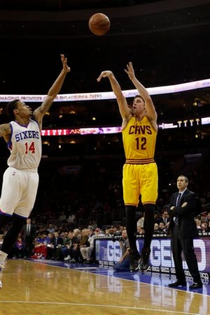 Cavaliers rookie Joe Harris shoots against the 76ers during a Jan. 5 game in Philadelphia. Harris was assigned to the D-League Canton Charge on Tuesday.