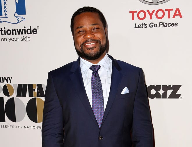 In this photo from Nov. 19, 2014, actor Malcolm-Jamal Warner attends the 2014 Ebony Power 100 Gala at The Avalon Hollywood in Los Angeles. Warner says it's difficult to see Bill Cosby face allegations of sexual assault. Warner, who played Cosby's son Theo in the hit 1980s sitcom "The Cosby Show, " told Billboard magazine that the comedian has been an important mentor and friend.