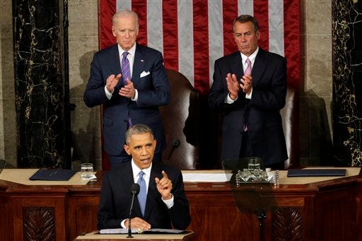 Vice President Joe Biden and House Speaker John Boehner of Ohio applaud President Barack Obama, on Capitol Hill in Washington, Tuesday, Jan. 20, 2015, during his State of the Union address before a joint session of Congress. (AP Photo/J. Scott Applewhite)