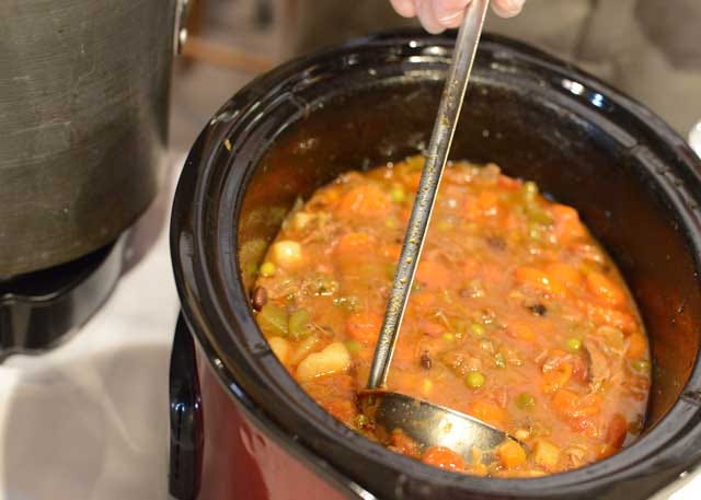 A crock pot filled with vegetable beef soup awaits hungry diners at last year’s Soup and a Bowl.