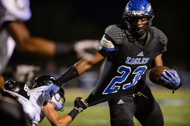 2014 Fayetteville Observer Region Football Player of the Year  Name: Farrell Murchison School: East Bladen Year: Senior Notes: Broke all the school rushing records. ... Finished career with 5,700 yards. ... Had 2,491 and 37 touchdowns this year.