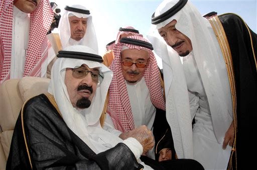 FILE - In this Monday, Nov. 22, 2010 file photo released by the Saudi Press Agency, Saudi Arabia's King Abdullah, left, speaks with Prince Salman, the Saudi King's brother and Riyadh governor, right, before the king's departure to United States, in Riyadh, Saudi Arabia. On early Friday, Jan. 23, 2015, Saudi state TV reported King Abdullah died at the age of 90.