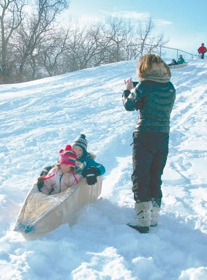 A full slate of activities await residents and visitors in Indian River January 23-25 at the Fifth Annual Winterfest. At last year’s event, Taylor and Marissa Jones ride the "Speed Express," taking first place in the cardboard sledding contest.