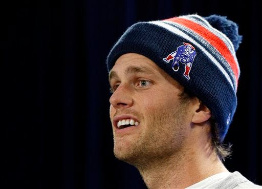 New England Patriots quarterback Tom Brady speaks at a news conference in Foxborough, Mass., Thursday, Jan. 22, 2015. Brady said Thursday that he did not know how New England ended up using underinflated balls in its win Sunday against the Indianapolis Colts in the AFC Championship game. 

AP Photo/Elise Amendola