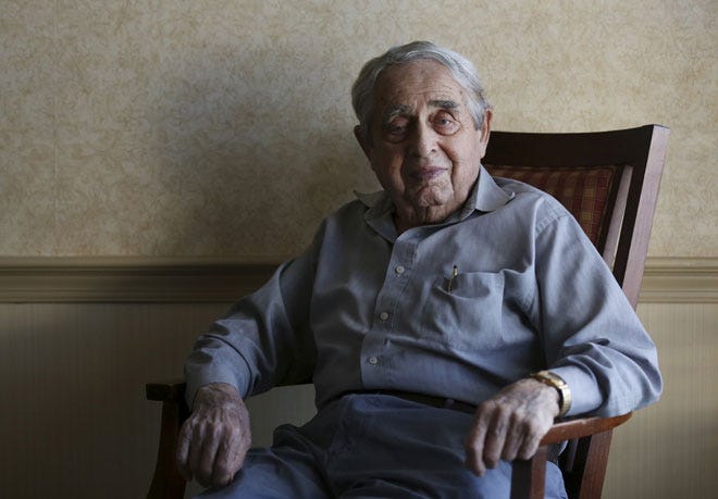 94-year-old Siegfried Meinstein, at his home at Sunrise on the Scioto, who is trying to prove to the IRS that he is still alive.