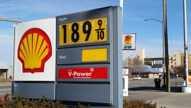 A sign shows the price of gasoline at a Shell station near downtown Detroit on New Year's Day. AAA Michigan said that the average cost of self-serve unleaded gasoline in the state was $1.97 a gallon, the first time the price has fallen below $2 a gallon since March 2009 and down 9 cents since the beginning of the week. Some suggest that low gas prices present an opportunity to add a revenue-neutral carbon tax to fossil fuels, while others fear such a move would simply benefit the government, not the environment. AP Photo/David N. Goodman