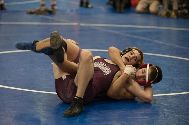 Neshaminy High School senior Justin Kramer won over Chichester Eagle Noah Harvey, a freshman, in the 138 weight class during the wrestling tournament at Neshaminy High School in Langhorne on Saturday afternoon.