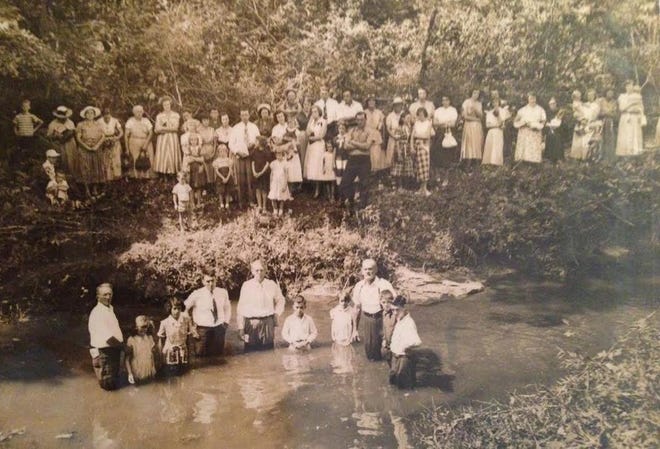 Members of Mountain Valley Baptist Church gather for a baptism in 1952.