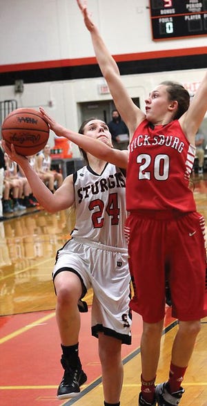 Harmony Groves of Sturgis heads in for two of her career-high 16 points against Vicksburg on Monday night.