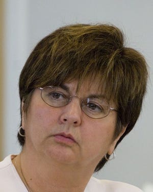 Mashpee Town Manager Joyce Mason, shown in this 2005 photo, will step down in June.