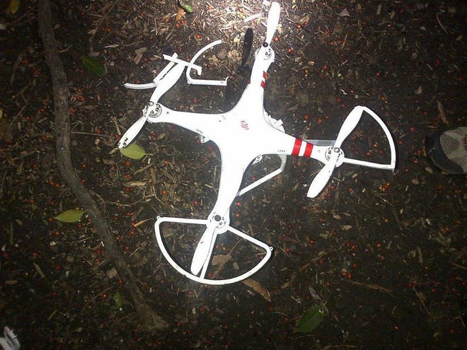 This handout photo provided by the US Secret Service shows the drone that crashed onto the White House grounds in Washington, Monday, Jan. 26, 2015. A small drone flying low to the ground crashed onto the White House grounds before dawn Monday, triggering a major emergency response and raising fresh questions about security at the presidential mansion. A man later came forward to say he was responsible and didn't mean to fly it over the complex. The man contacted the Secret Service after reports of the crash spread in the media, a U.S. official said. The man told the agency that he had been flying the drone recreationally. The man is a Washington resident and is cooperating with investigators. (AP Photo/US Secret Service)