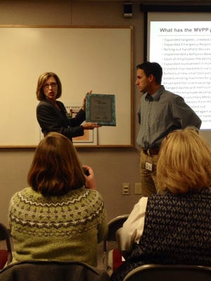 MIOSHA Director Martha Yoder presented a plaque Jan. 28 to Albemarle Corporation South Haven plant manager Dru Manuel. PHOTO PROVIDED