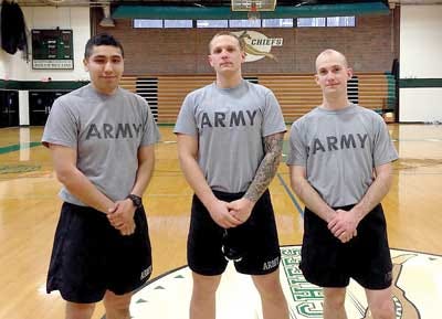 Submitted Photo - Left-to-right, Staff Sgt. Jose Martinez, Sgt. Thomas Steele, and Staff Sgt. Erik Totten stand in the Hopatcong High School gym earlier this month.