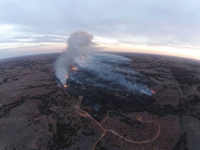 (Photo Courtesy of Red Hills Rancher) An Aerial photo of the wildfire burning South West of Medicine Lodge on Wednesday.